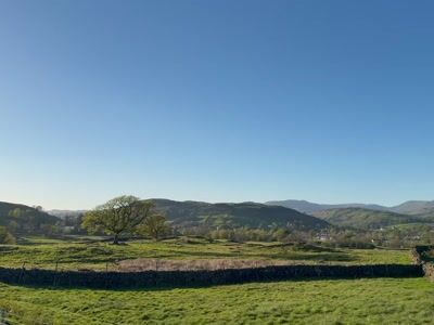 Green field with stone walls