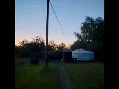 Yurt and amenities at sunset